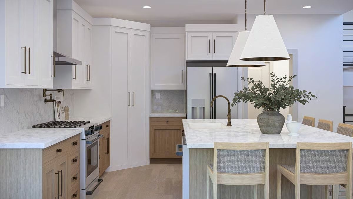 Brass Fixtures and Two-Tone Cabinetry Make a Strong Case for Mixing Wood Tones