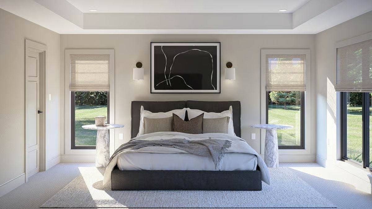 Dark Headboard Against Greige Walls Proves You Don't Need Color to Make a Bedroom Work
