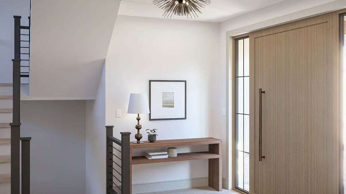Sputnik Chandelier and Walnut Console Set the Tone at the Front Door