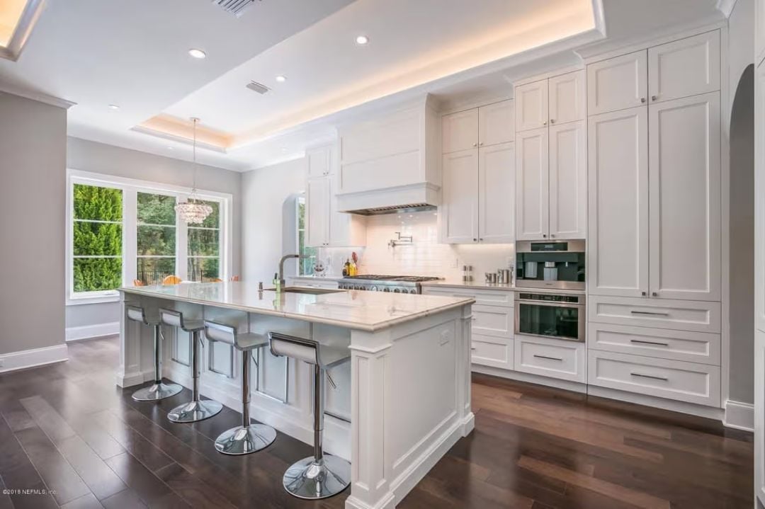 Pot Filler, Panel-Ready Hood, and a Waterfall Island That Earns Its Square Footage