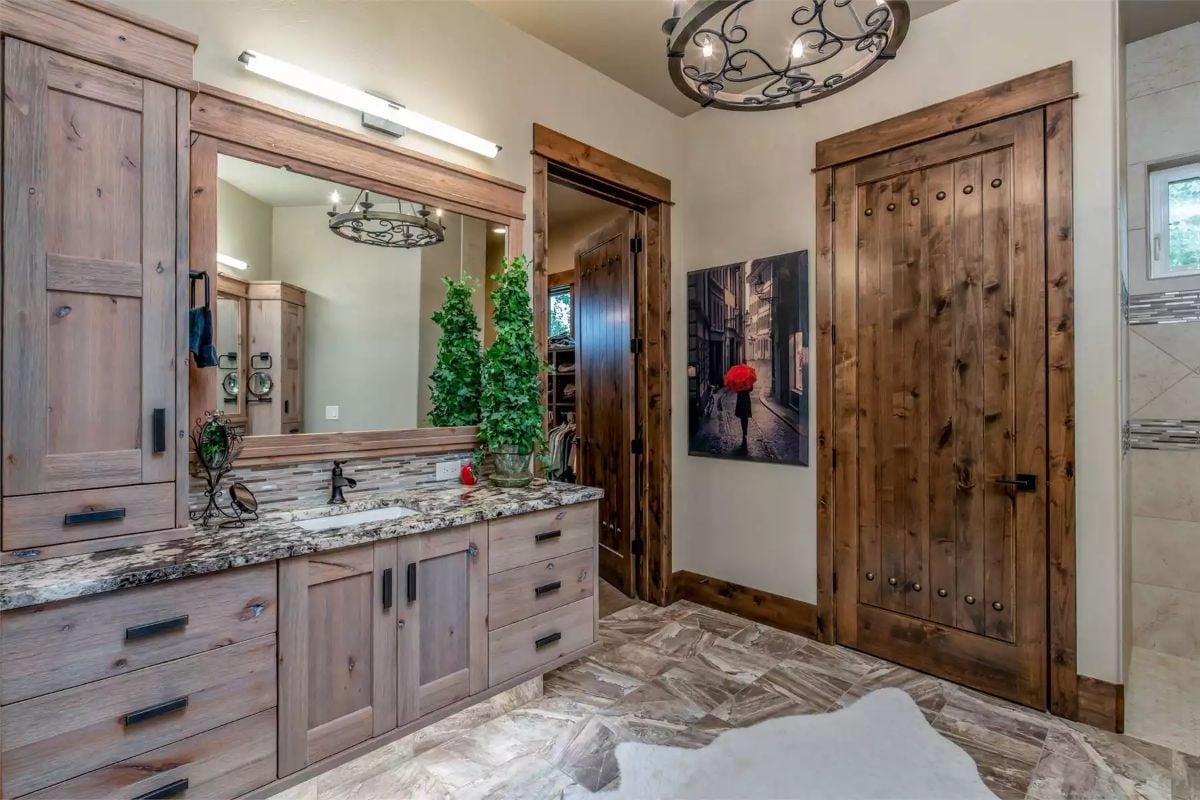 Knotty Alder Cabinetry and a Studded Door That Belongs in a Spanish Hacienda