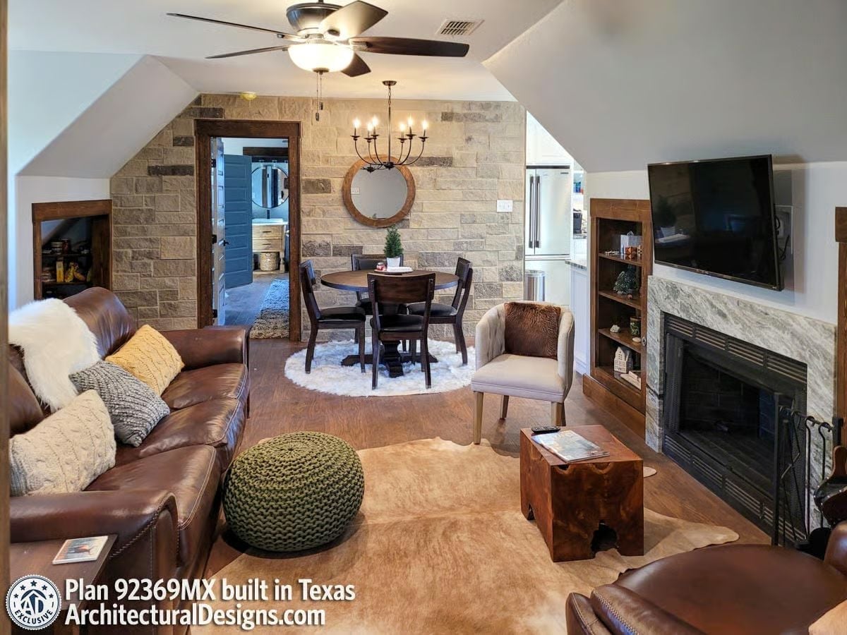 Leather, Stone, and a Round Dining Table That Anchors the Whole Space