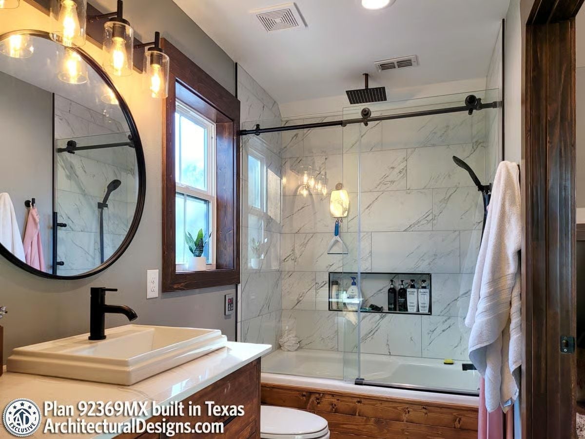 Marble Tile and Matte Black Hardware Built for Two People Who Take Long Showers