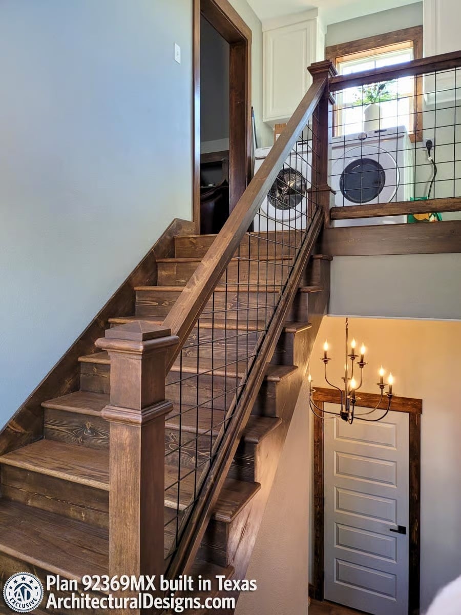 Wire Panels and Dark Wood Turn a Stairwell Into Something Worth Pausing At