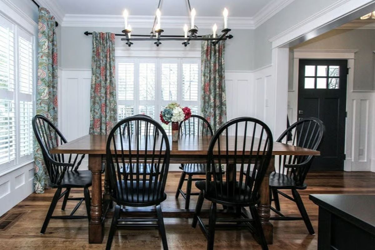 Windsor Chairs and Floral Drapes Pull Off Something Most Dining Rooms Can't