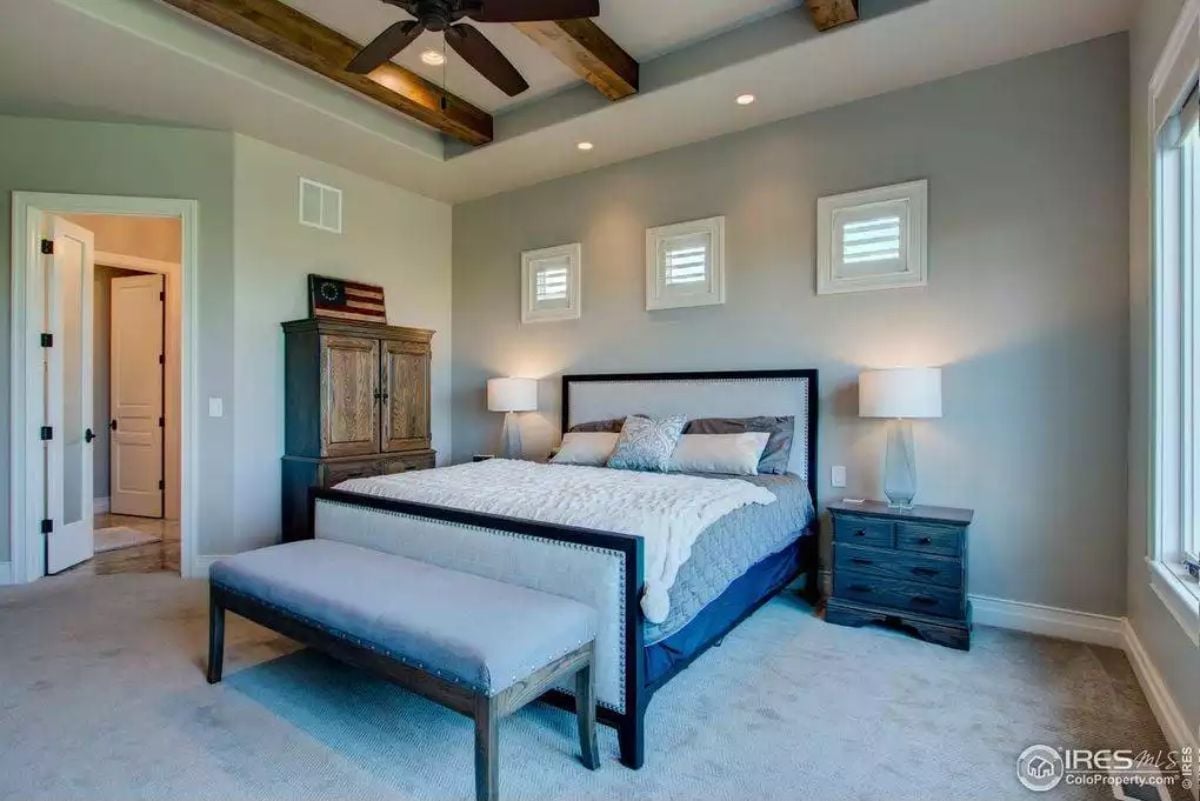Exposed Ceiling Beams, Nailhead Trim, and a Bench That Earns Its Spot