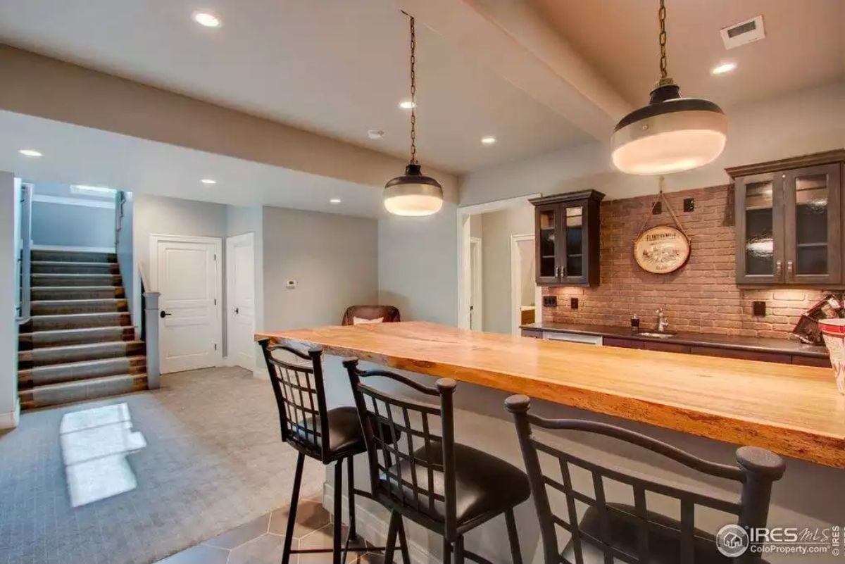 Live-Edge Bar Top, Pendant Chains, and a Brick Backsplash Worth Keeping