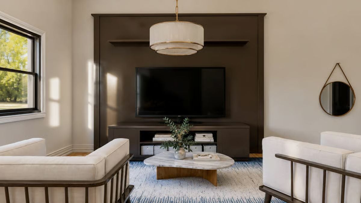 Dark Built-Ins and a Marble Coffee Table That Earn Their Place
