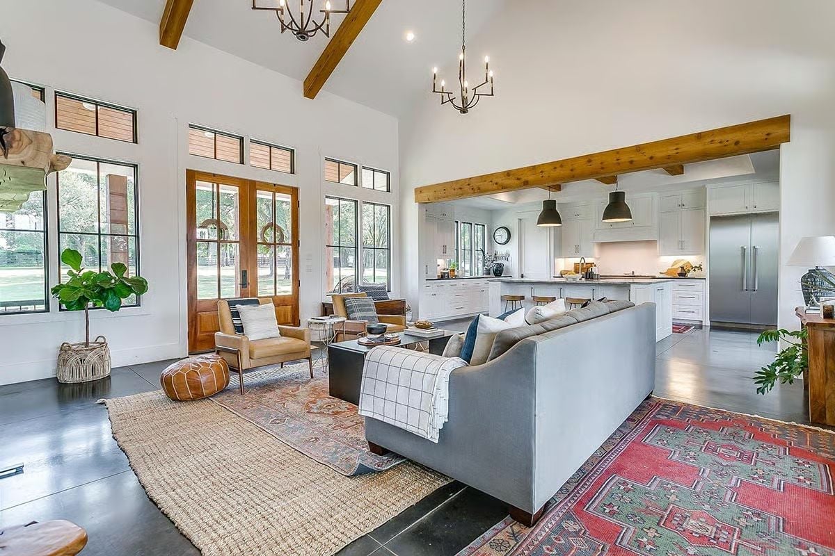 Exposed Beams and an Open Kitchen Make This the Room Nobody Wants to Leave