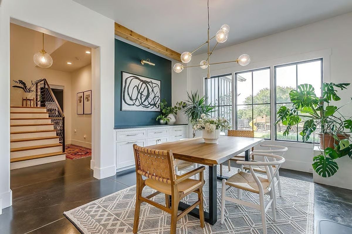Teal Accent Wall, Brass Chandelier, and a Dining Room That Earns Its Square Footage