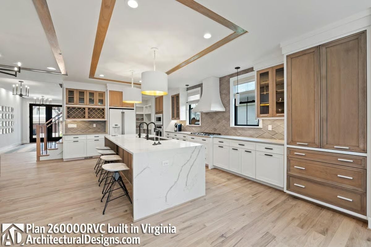 Marble Island, Two Cabinet Finishes, and a Ceiling That Earns Its Keep
