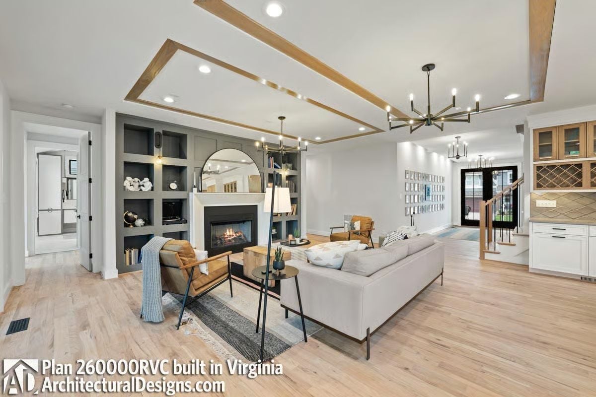 Warm Wood Beams and a Gray Built-In Make This Living Room Work Hard
