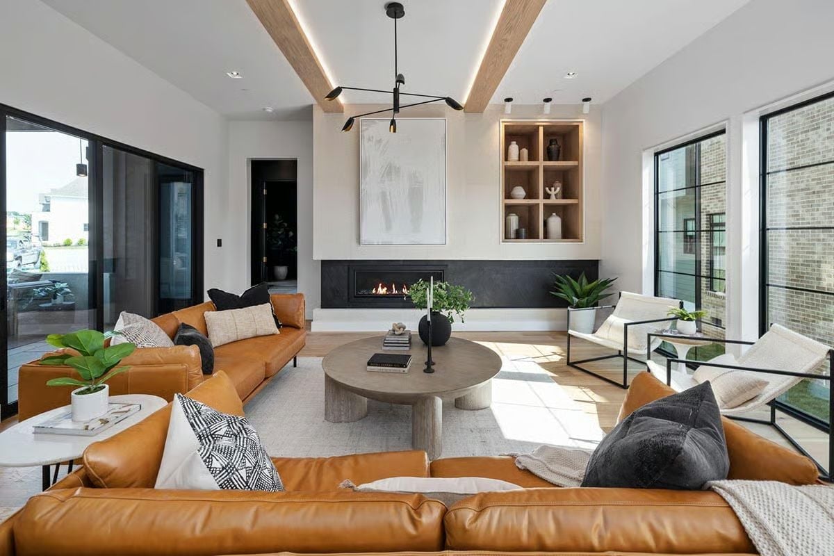 Cognac Leather and a Linear Fireplace Make a Strong Case for Staying Home