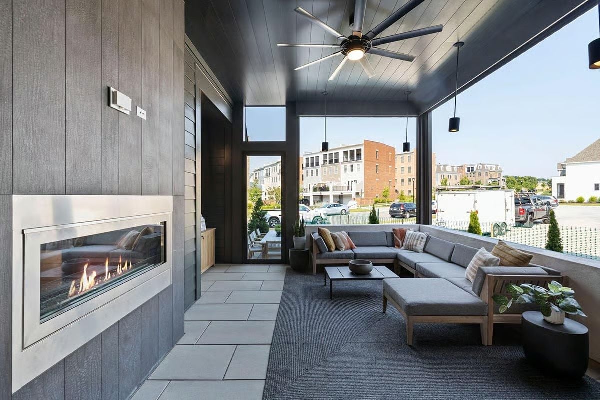 Covered Porch With a Linear Fireplace That Earns Its Place Year-Round