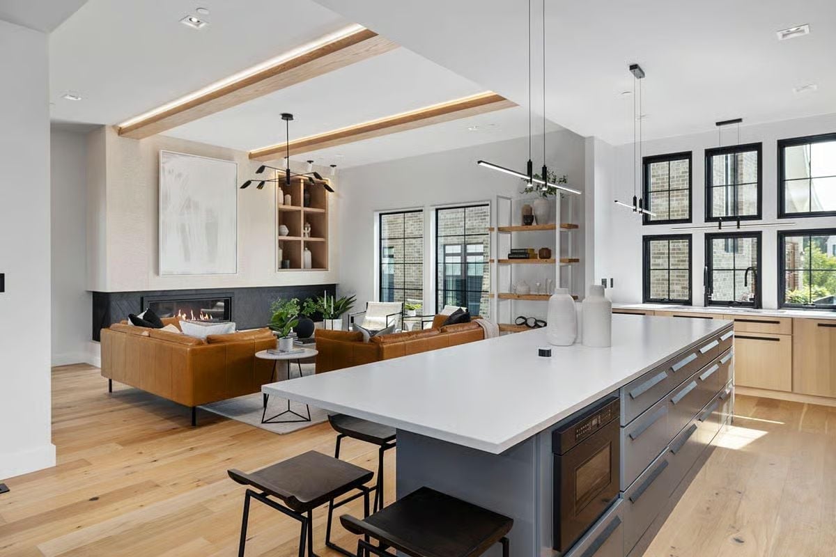 Gray Island, Warm Wood, and a Kitchen That Actually Connects to the Rest of the House