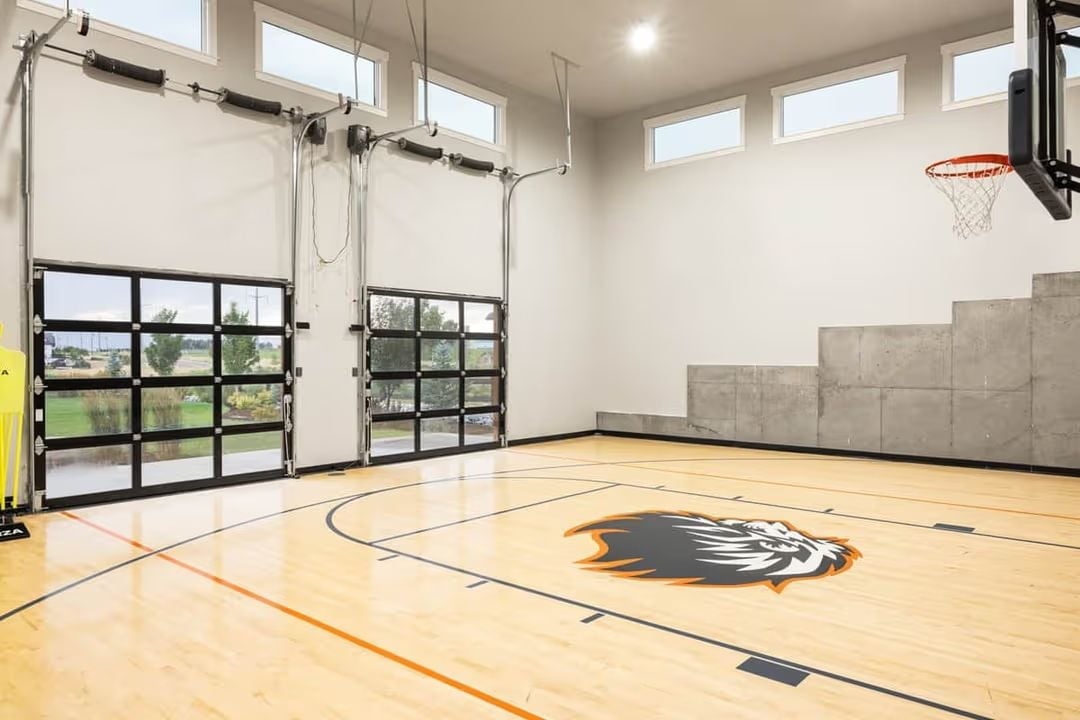 Glass Garage Doors, a Lion at Half Court, and Bleachers Built Into the Wall