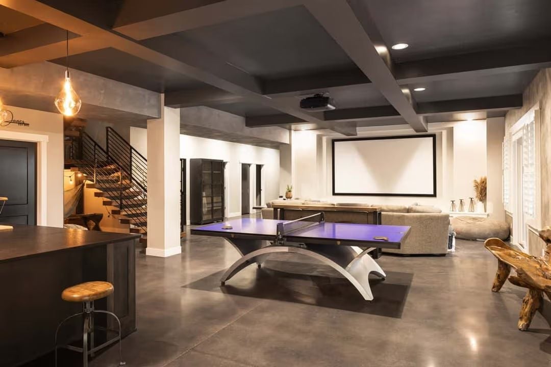 Polished Concrete, a Purple Ping-Pong Table, and a Projector Screen Worth the Square Footage