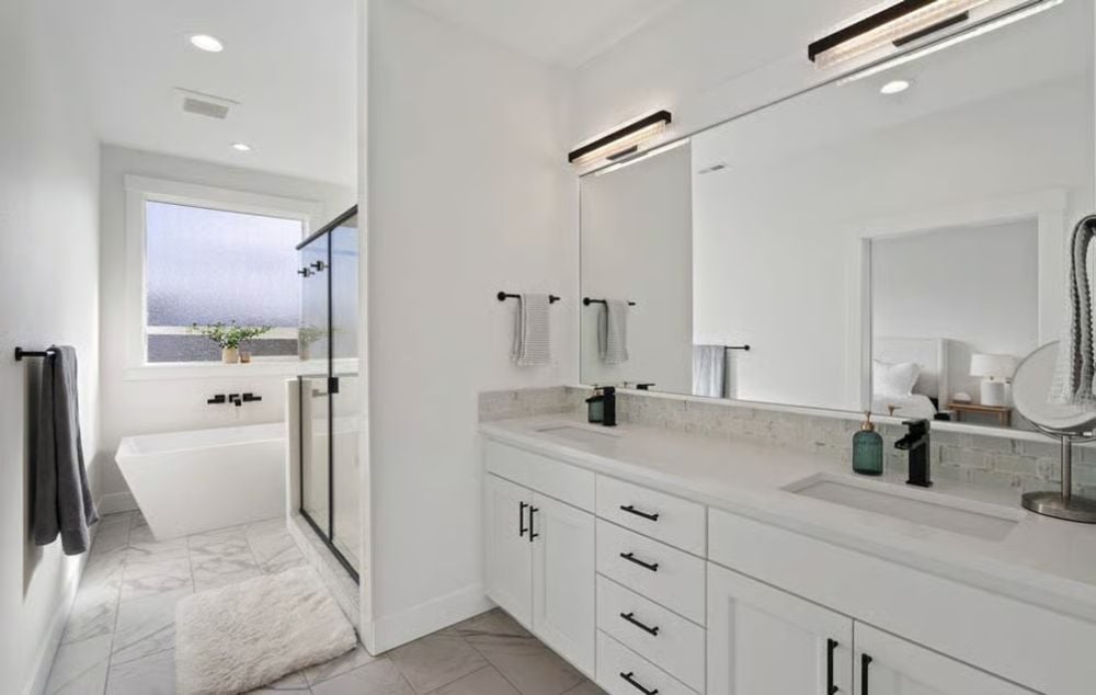 Double Vanity With a View Straight Into the Bedroom