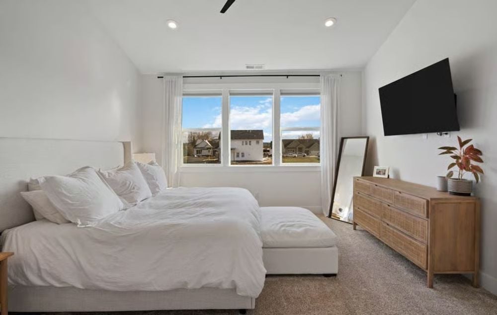 Neutral Bedroom Where the Dresser Does More Work Than the Decor