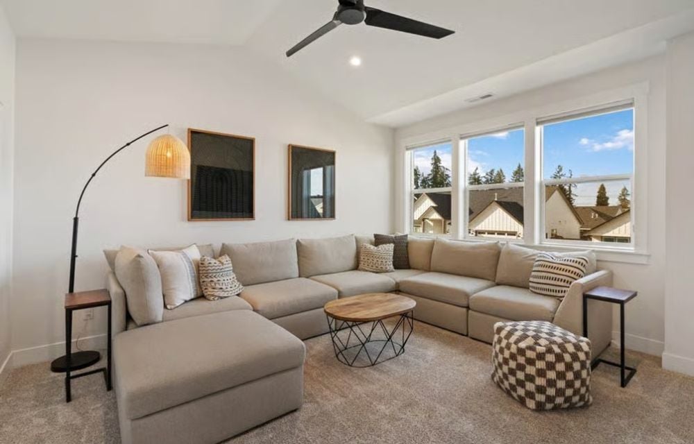 Sectional, Arc Lamp, Ottoman — Bonus Room Furniture That Knows Its Job