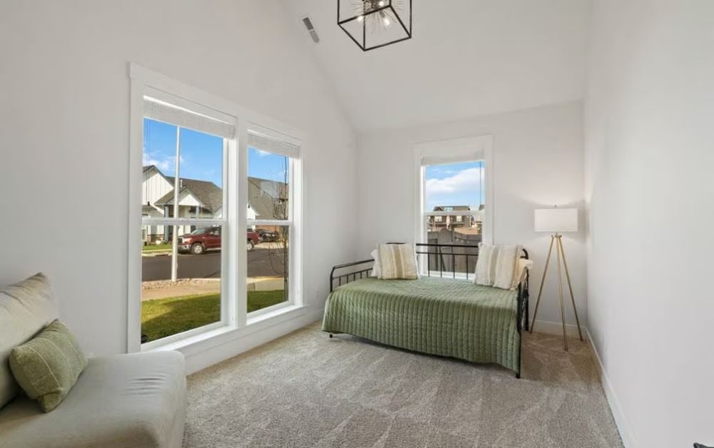 Vaulted Ceilings and a Daybed Make This Guest Room Worth the Climb Upstairs