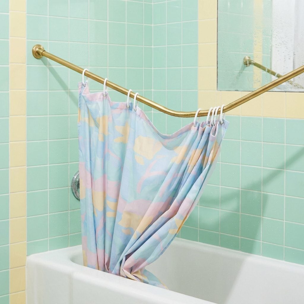 The Brass Shower Curtain Rod With the Tension Springs Inside
