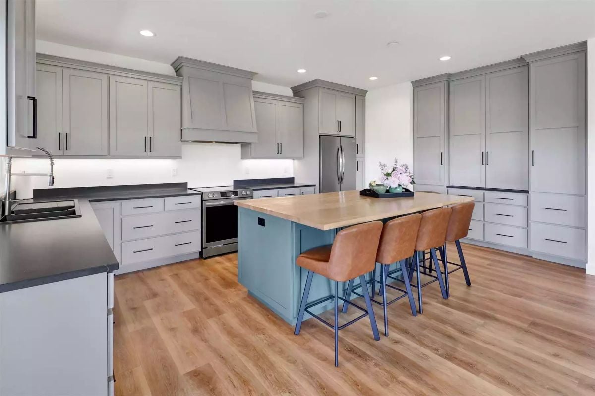 Gray Cabinets Do the Heavy Lifting So the Island Gets to Have Fun