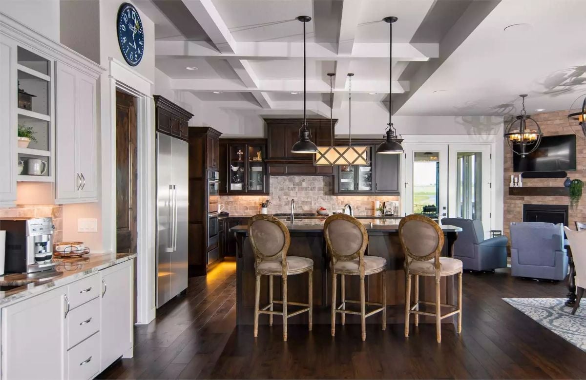 Dark Cabinetry and Coffered Ceilings Pull This Kitchen Well Above Its Weight Class