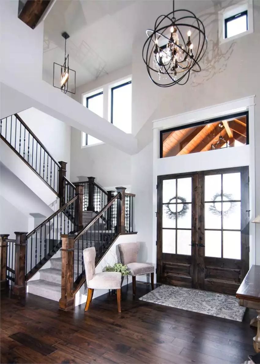 Orb Chandelier and French Doors Set the Tone Before You've Taken Off Your Coat