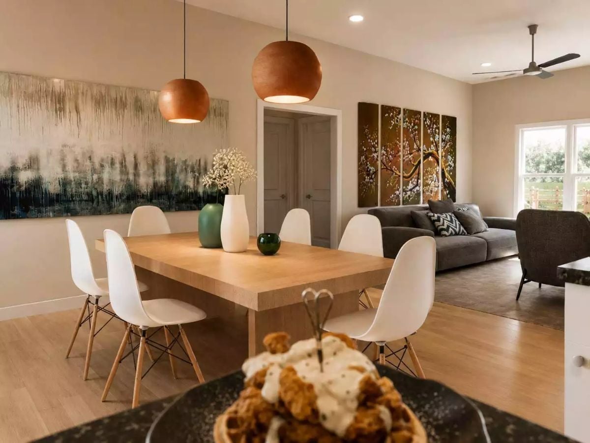 Copper Pendants Do the Heavy Lifting Above a Table Built for Eight