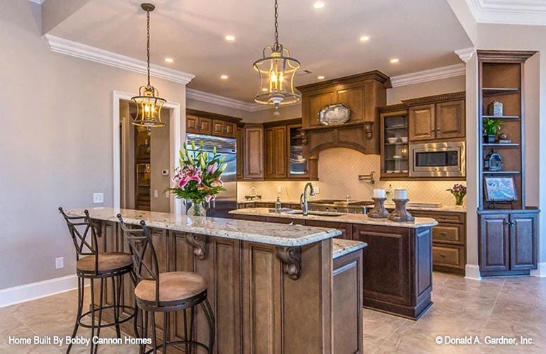 Pendant Lights and Granite That Make the Kitchen Feel Like the Heart of the House