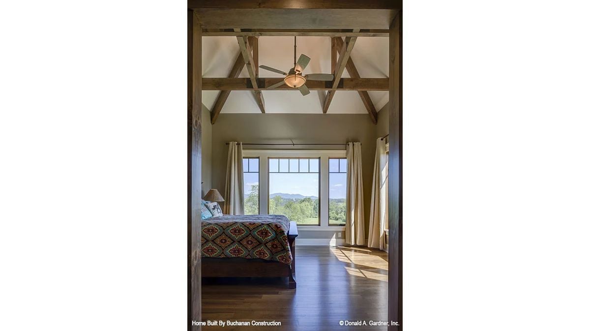 Scissor Trusses, Hardwood Floors, and a View That Does All the Work