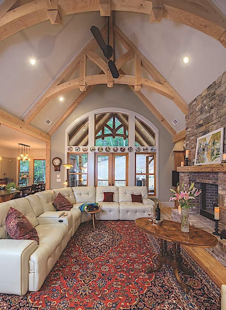 Scissor Trusses and a Stone Fireplace Make This Lodge Room Hard to Leave