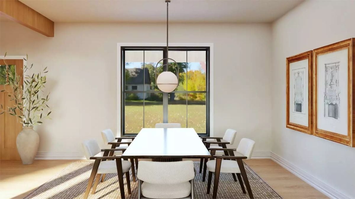 Orb Pendant, White Table, Black Frames: Mid-Century Dining Done Right