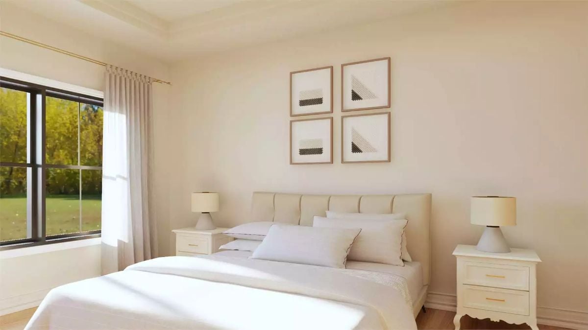 Warm White Bedroom Where Sunlight Does Most of the Decorating