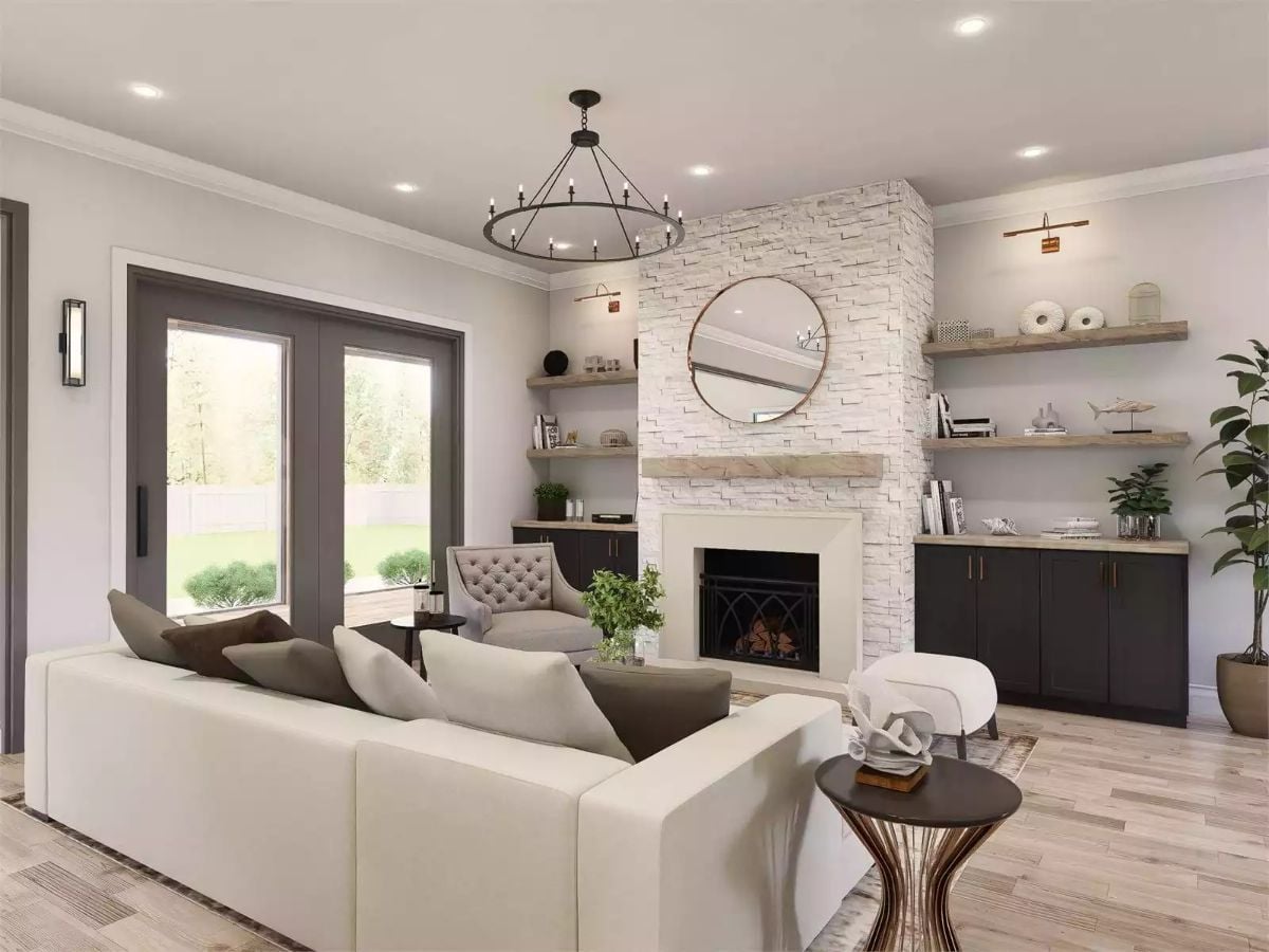 Stacked Stone Fireplace Anchors a Room Built Around Two Kinds of Light
