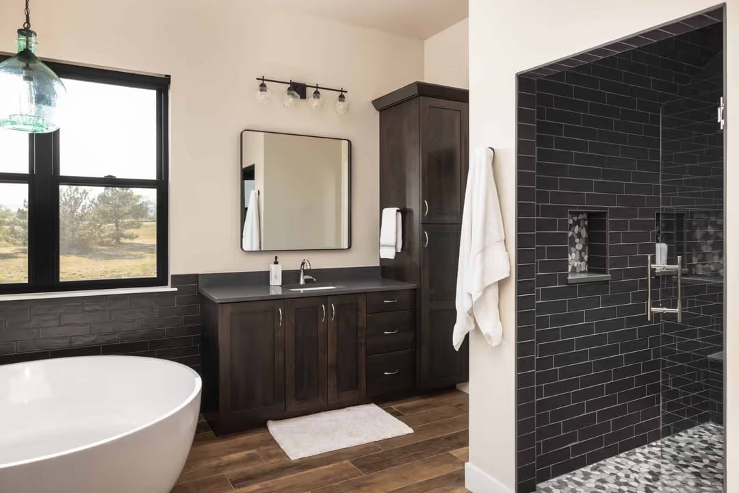 Dark Subway Tile From Floor to Ceiling Earns Its Place in This Shower