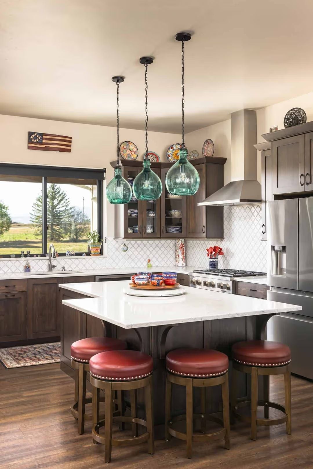 Red Leather Barstools and Teal Glass Pendants Shouldn't Work Together, But They Do