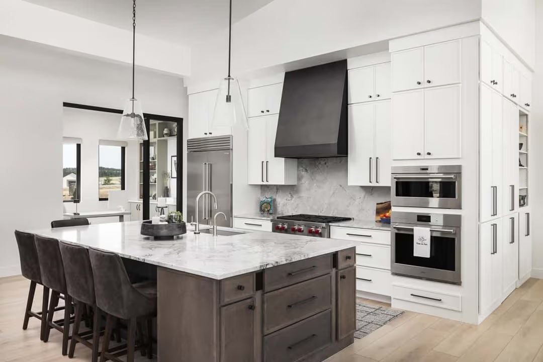 Dark Hood, Two-Tone Island, and a Cooktop That Means Business