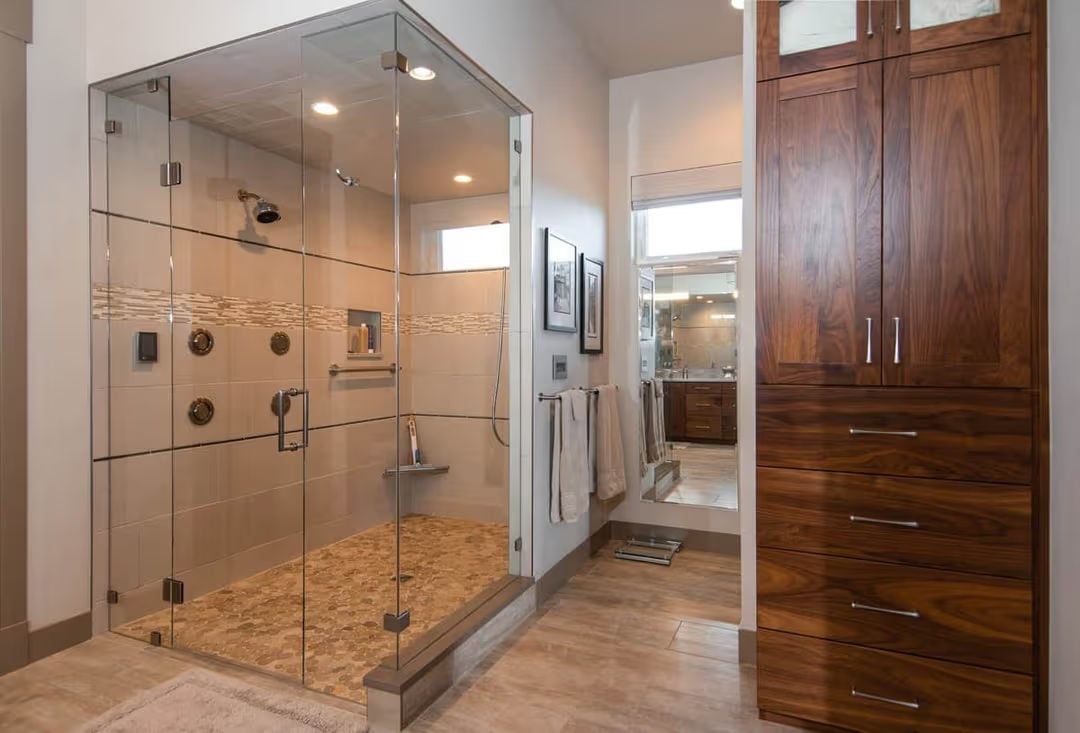 Frameless Glass, Mosaic Stone Floor, and Body Sprays Worth Scheduling Your Morning Around