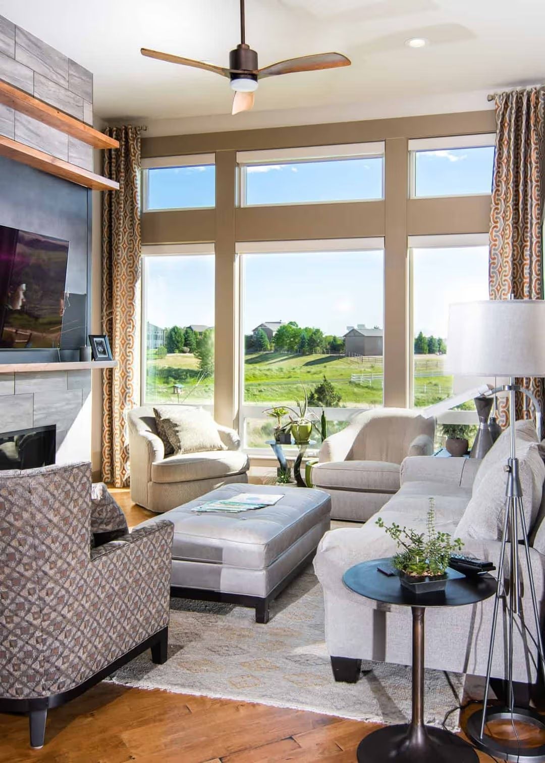 Wraparound Windows and a Fireplace Wall That Holds Its Own Against the View