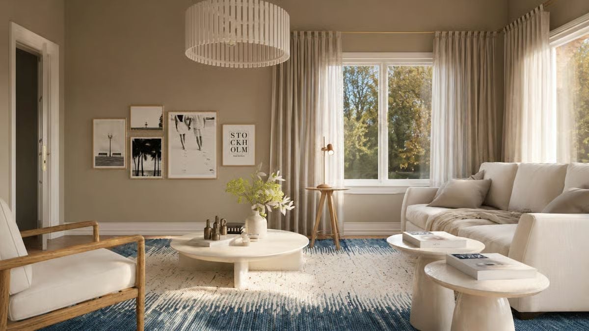 Warm Walls, Round Tables, and a Rug That Anchors the Whole Room