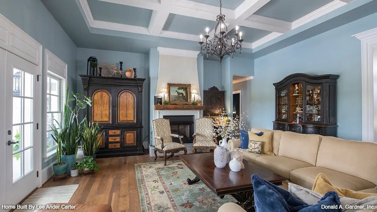 Coffered Ceilings, Candlelight Chandelier, and a Cabinet That Owns the Room