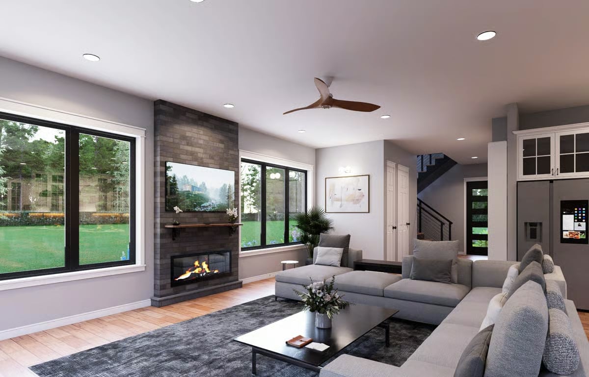 Dark Brick Fireplace Wall Does the Heavy Lifting in This Gray Living Room