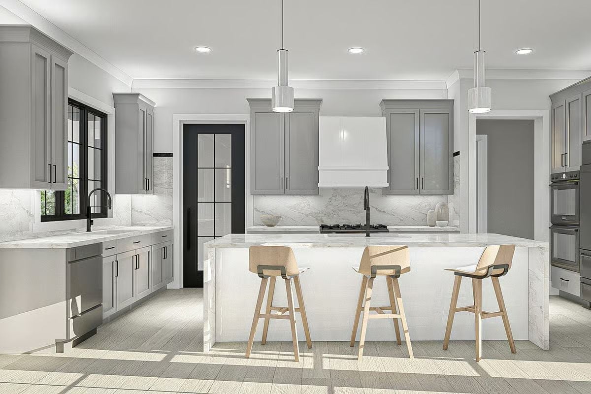 Gray Shaker Cabinets and Marble Counters Built for a Kitchen That Actually Gets Used
