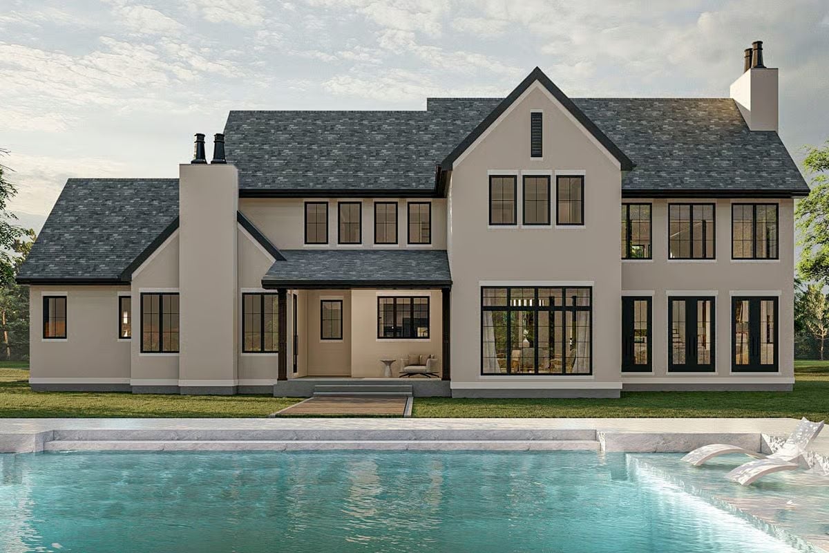 Pale Stucco and Black Trim Pull the Eye Straight to the Pool