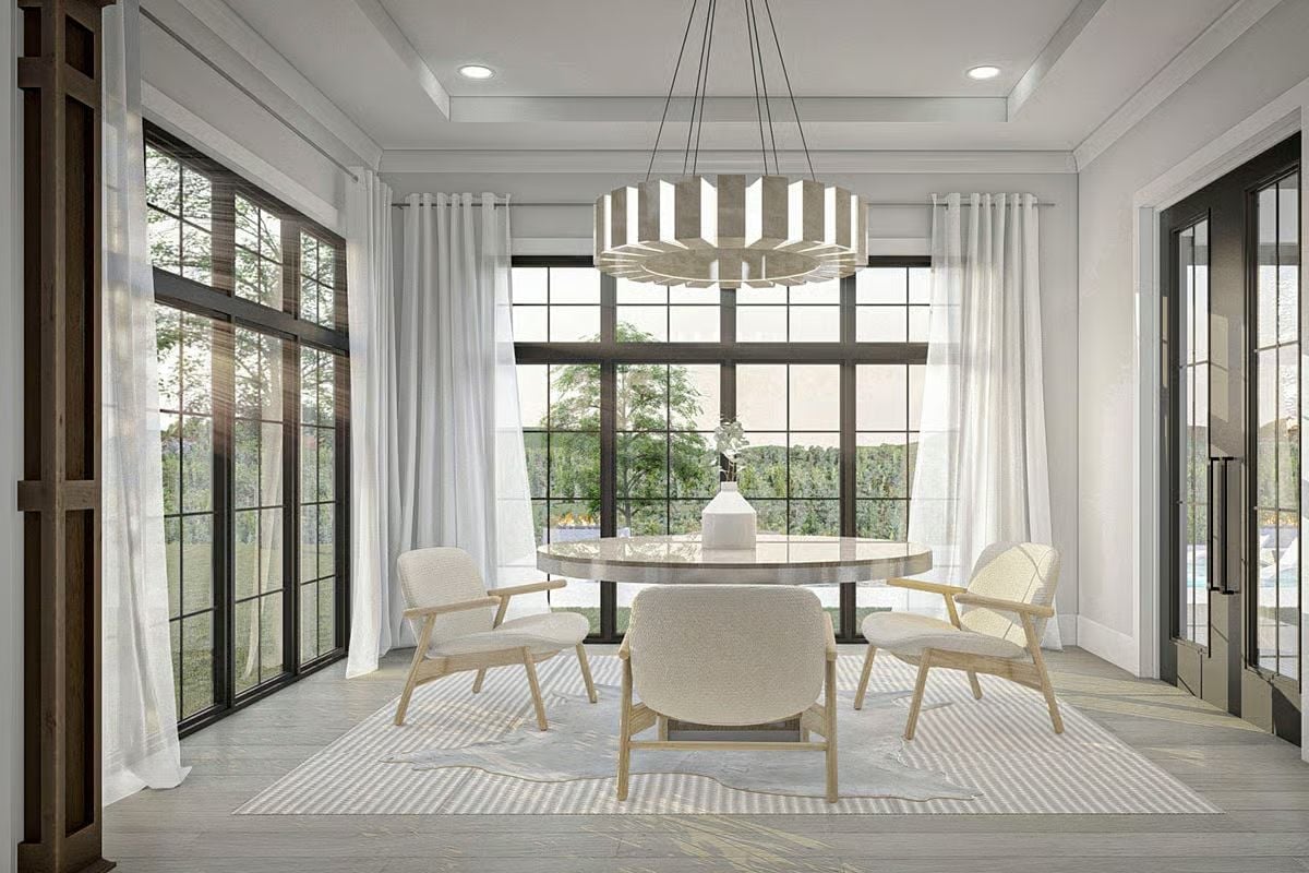 Round Marble Table and Boucle Chairs in a Room That Doesn't Need to Try Hard