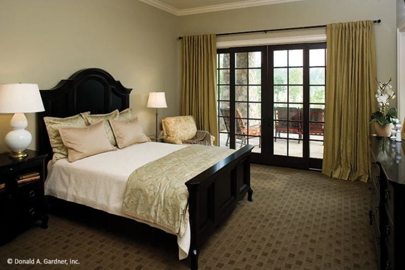 Black Lacquer Beds and French Doors Earn Their Keep in a Guest Suite Like This