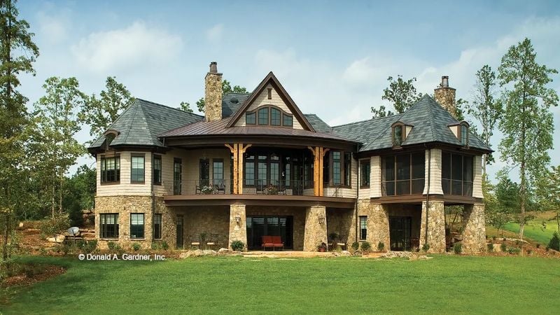 Conical Turrets and Timber Framing Anchor a Rear Elevation Built to Last