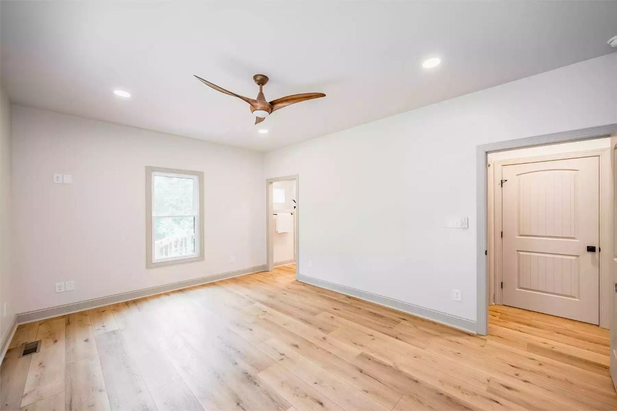 Bare Wood Floors and a Three-Blade Fan That Set the Tone Before Furniture Arrives